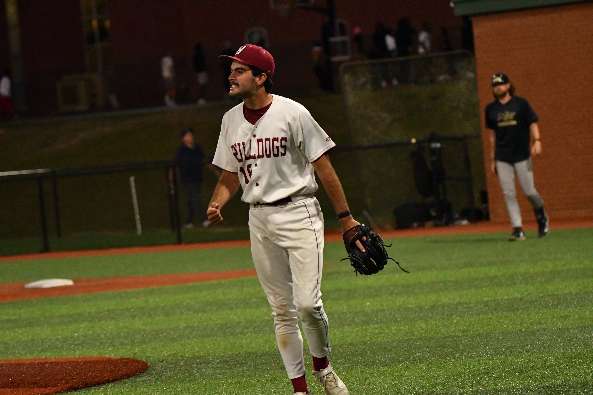 Warner Young celebrates a big out during the second game vs. Northeast. Young picked up the win in the contest.
