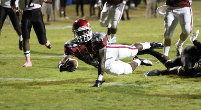 Jacorie Ousley dives in for his second touchdown of the night from 19 yards out.